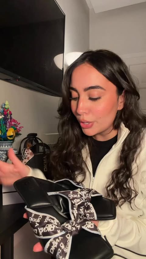 Instagram post by @tala.alsabi for DKNY. Caption reads: [...] with the ramadan collection from @dkny.me 💫....