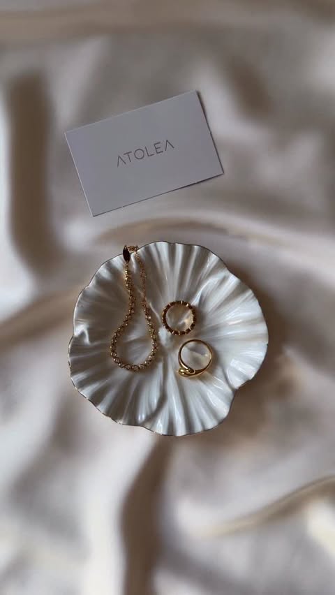 Instagram post by @reemakakria9 for Atolea Jewelry. Caption reads: Simply stunning @atoleajewelry....