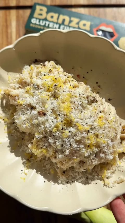 Instagram post by @flavorsbyyulia for Banza. Caption reads: [...] pasta with lemon + parmesan ✨ made with....