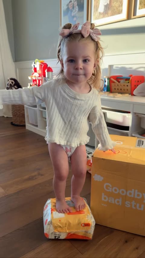 Instagram post by @carissabarzee for Hello Bello. Caption reads: [...] she wears…including her diaper!😅🎀🤍....