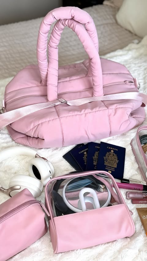 Instagram post by @claudiaaguzzo for MYTAGALONGS. Caption reads: Pack with me ✈️🤍 Found this @mytagalongs duffle....