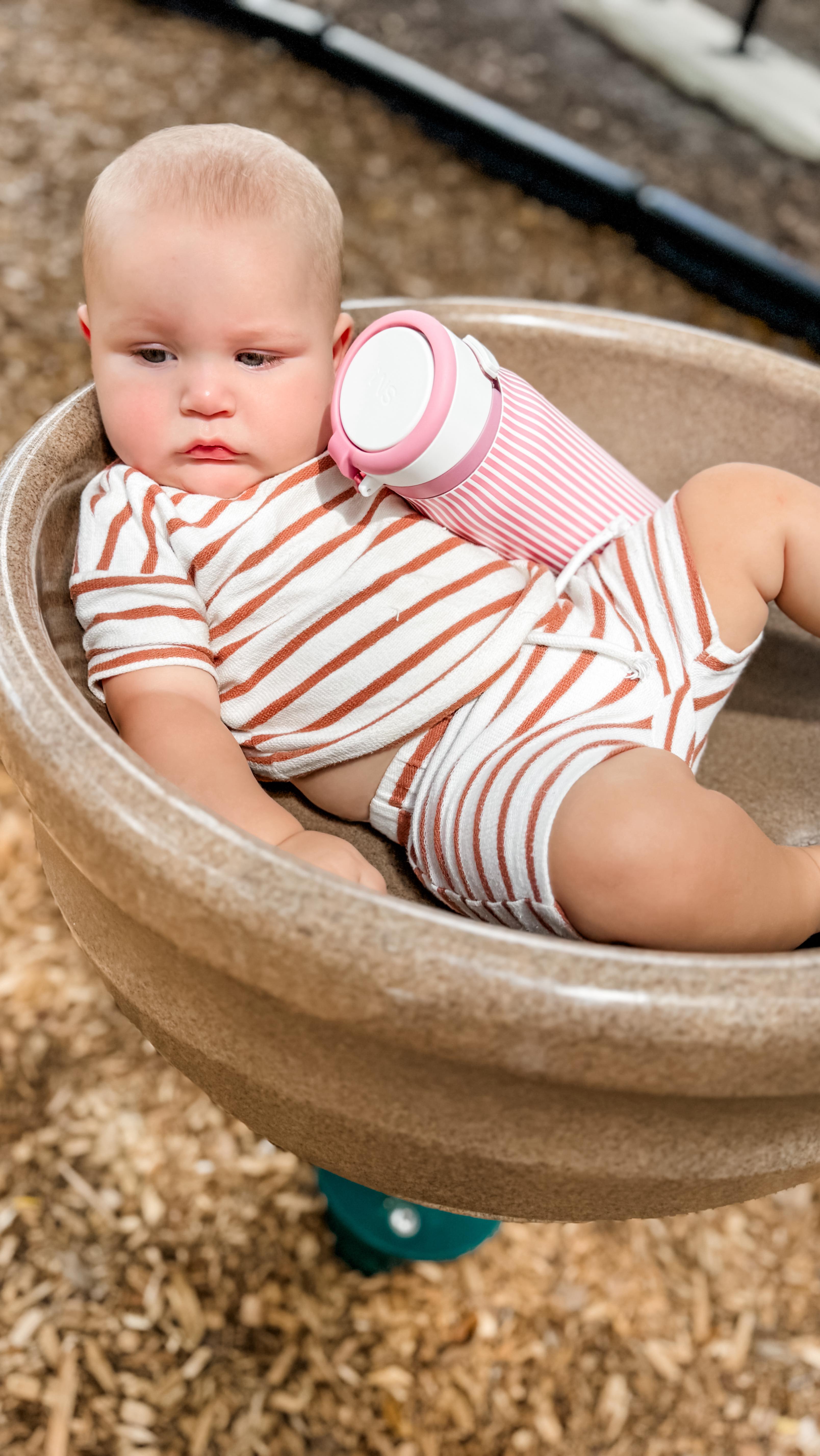 Instagram post by @bridgetjbeck for Simple Modern. Caption reads: If only wrangling kids was as easy as carrying....