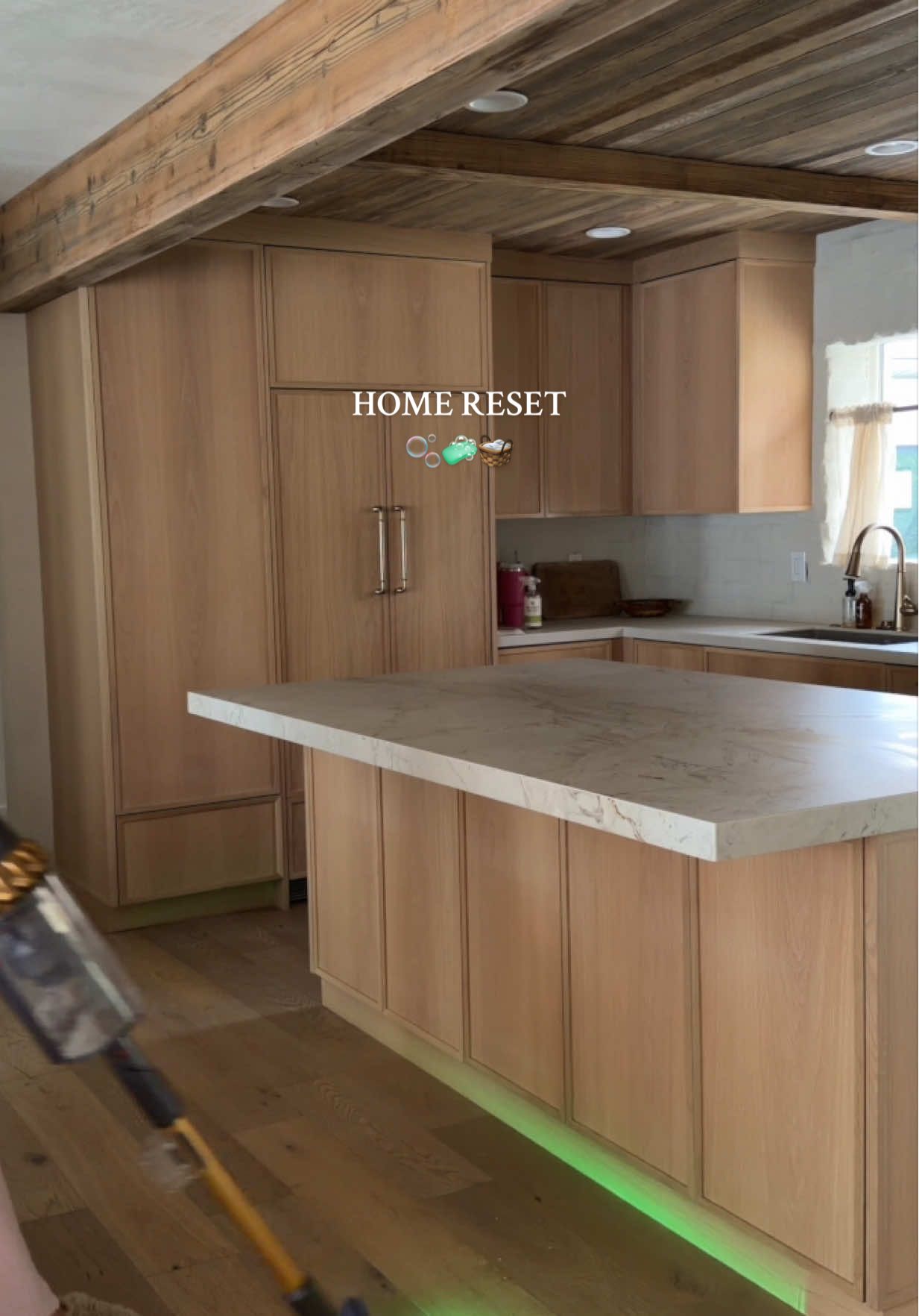 TikTok post by @whitneyysimmons for Alani Nutrition. Caption reads: HOME RESET 🫧🧺🧼🤍 hehe it’s been a while since....