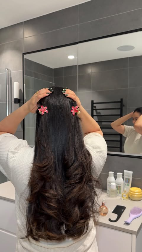 Instagram post by @wiinnyypooh for OUAI. Caption reads: A wash-day routine for frizz and dry....