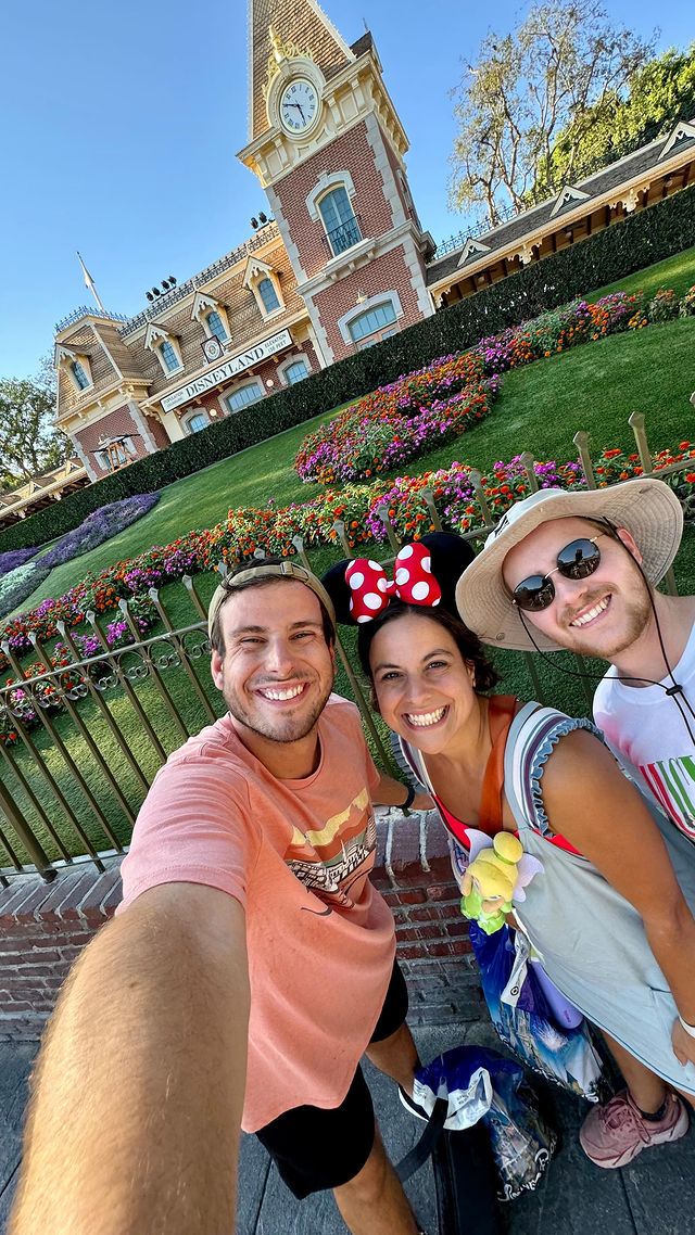 Instagram post by @thethemeparkdad for Thomas Kinkade Studios. Caption reads: People do crazy things… when they’re in love with....