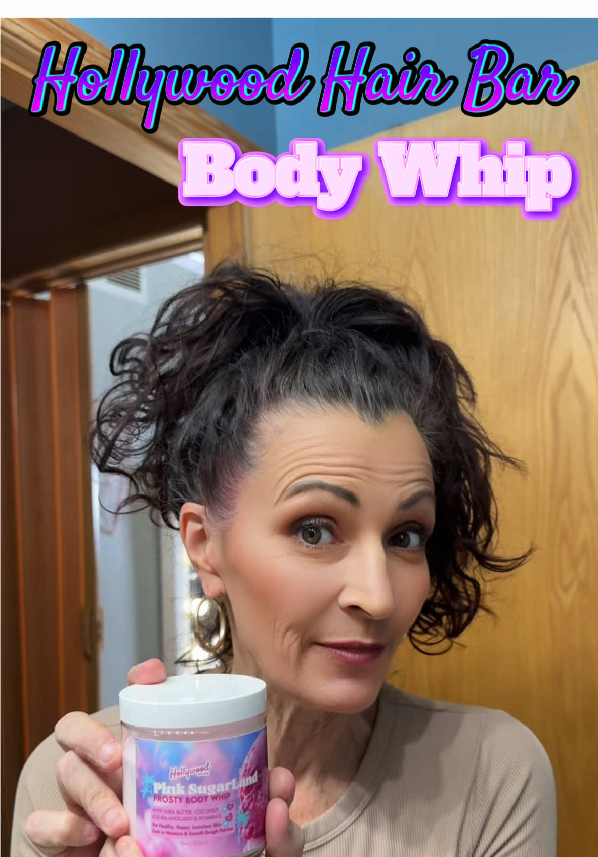 TikTok post by @dawnntonya for Hollywood Hair Bar. Caption reads: Hollywood Hair Bar body whip is to die for!....