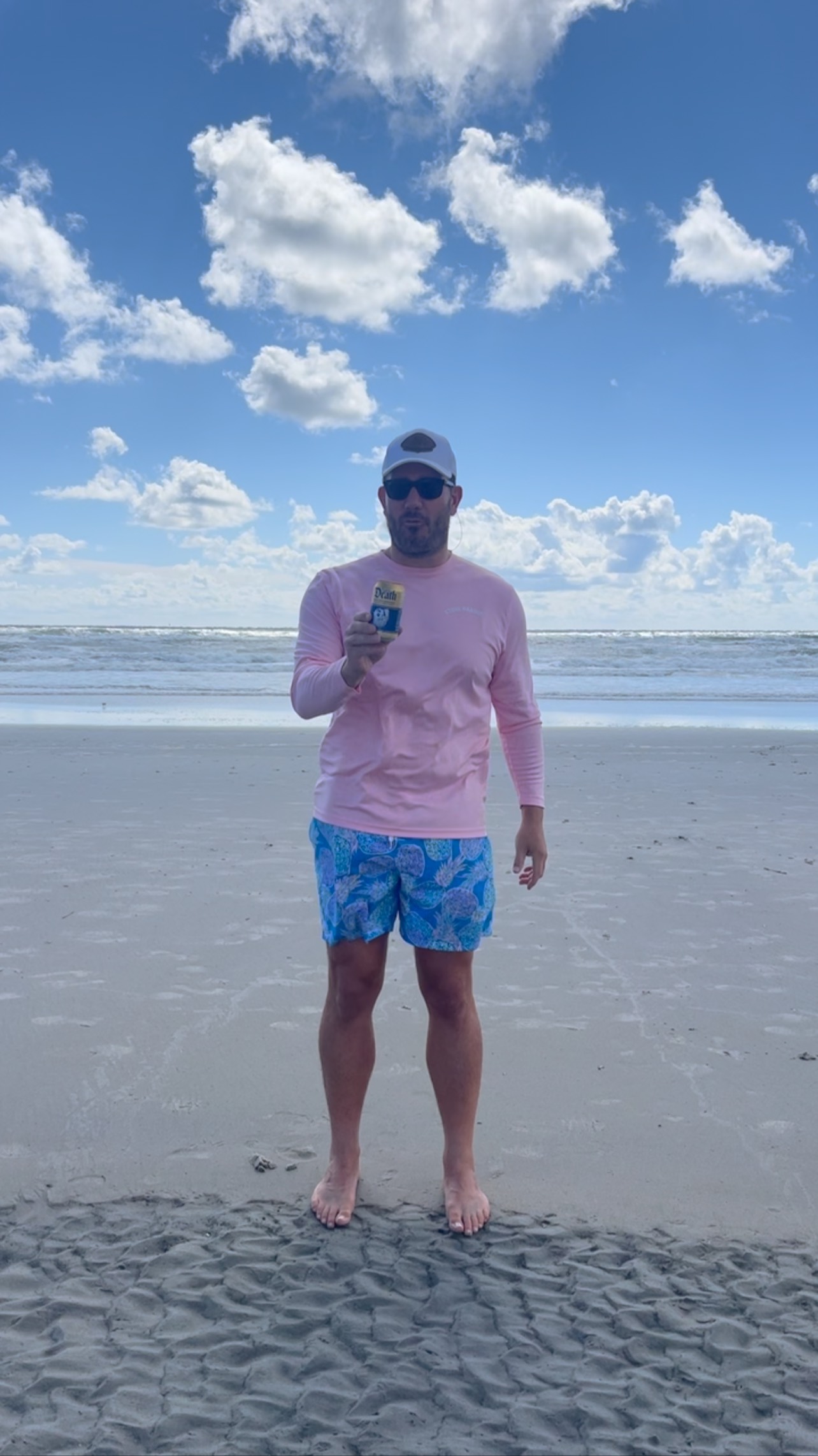 Instagram post by @rosstuckernfl for Liquid Death. Caption reads: [...] very windy last day of beach season:....