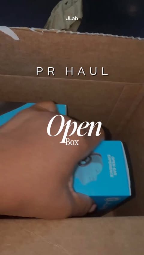 Instagram post by @chitowntina for JLab. Caption reads: Open Box Day with JLab just made my day 🎧🔥....