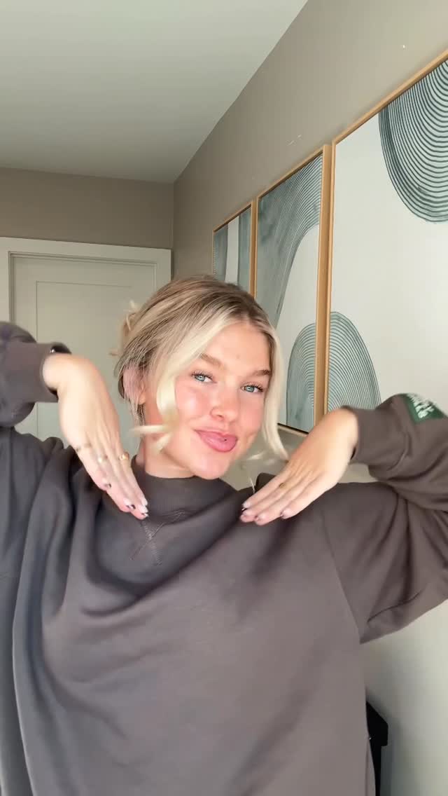 Instagram post by @kennedygpowers for OUAI. Caption reads: forever my favorite claw clip style 🤍✨🫶....