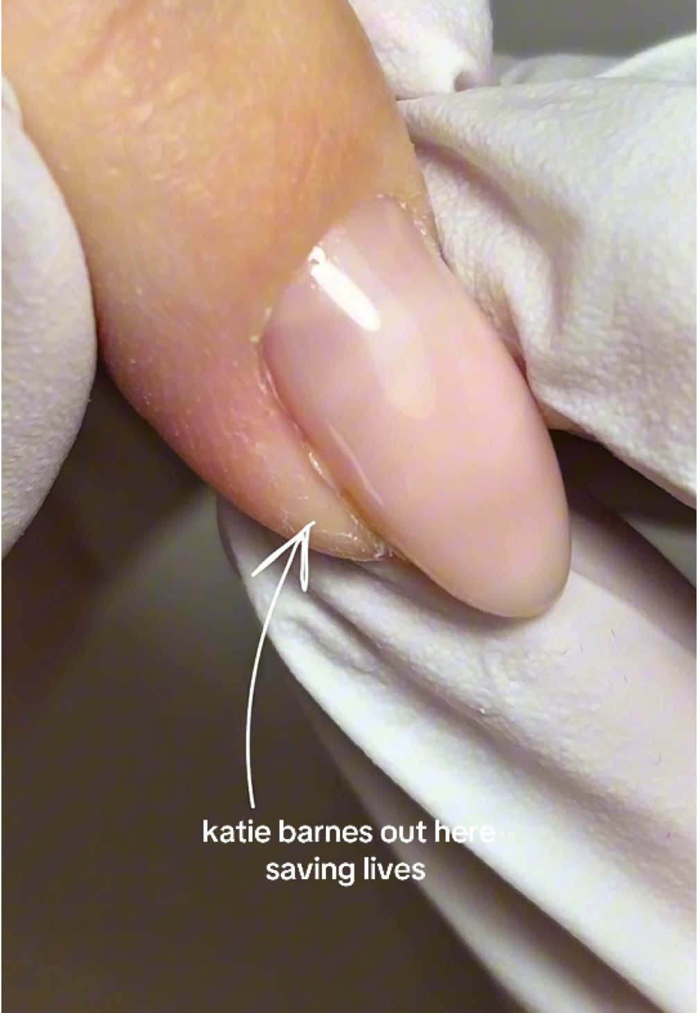 TikTok post by @thegelstudio_ for Katie Barnes Tool Range. Caption reads: [...] to fix any cuticle flooding! @Katie Barnes....