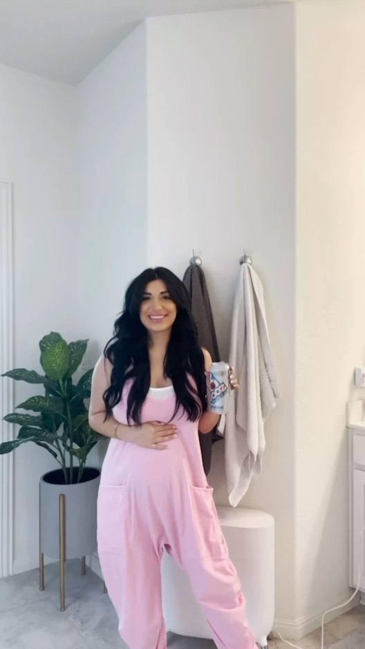 Instagram post by @nadia for Bang Energy. Caption reads: GRWM at 26 weeks pregnant 🫶🏼🤰🏻✨....