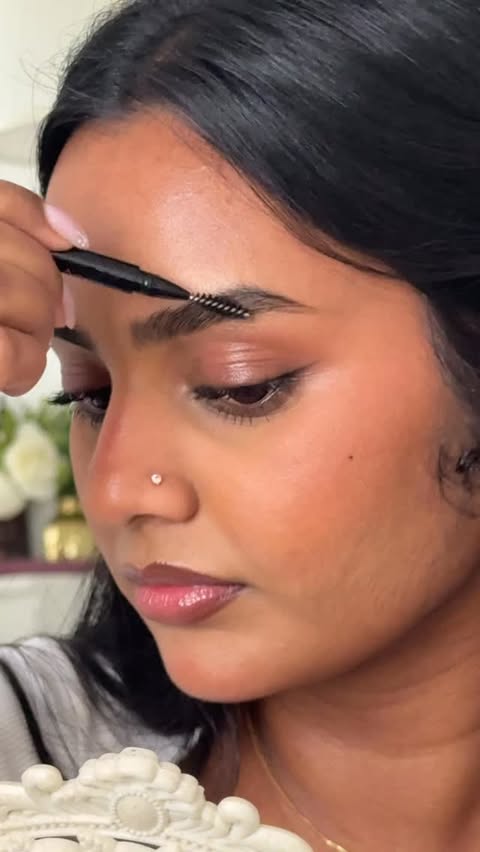 Instagram post by @beautybysriidevy for Anastasia Beverly Hills. Caption reads: Microstroke brow pen @anastasiabeverlyhills.