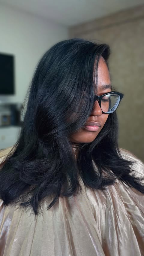 Instagram post by @kirasbeautybar for Design Essentials. Caption reads: [...] our natural hair all year long 💕....