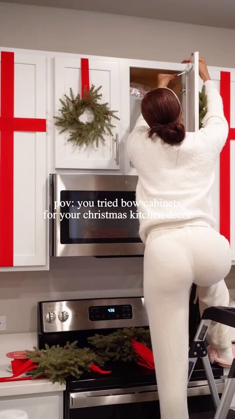 Instagram post by @loveartesia for Hobby Lobby. Caption reads: this is your sign to try the viral bow cabinets....