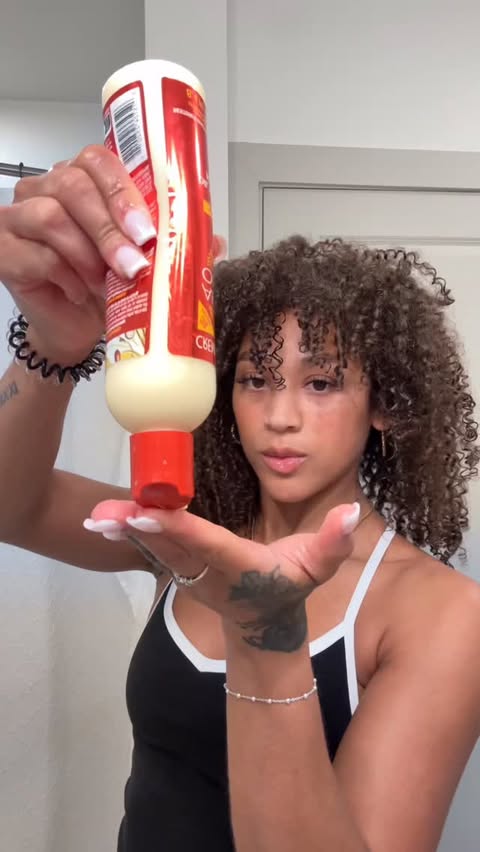 Instagram post by @essentialsummer for Creme of Nature. Caption reads: how to refresh 7 day curls with @cremeofnature ✨ I....