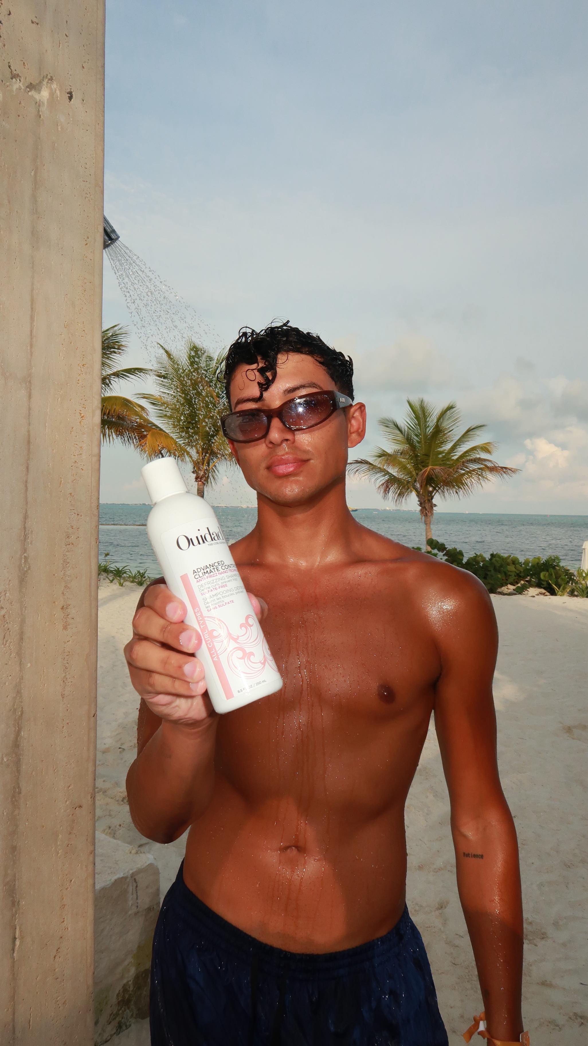 Instagram post by @kennethpabon for Ouidad. Caption reads: #ad Perfect curls in any climate courtesy of....