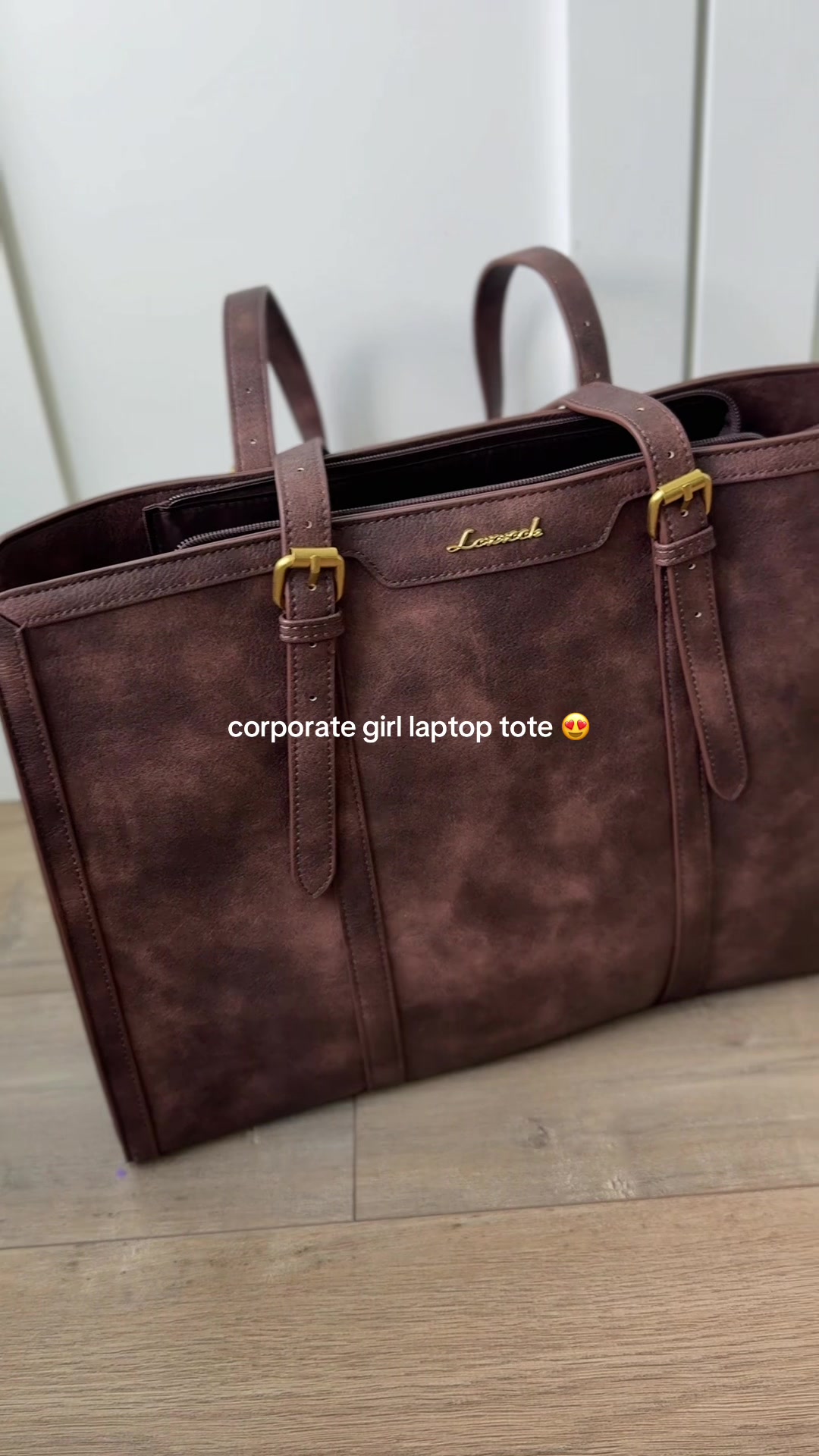 TikTok post by @alyssabeseris for Lovevook. Caption reads: [...] bag for the corporate work girlies 👏....