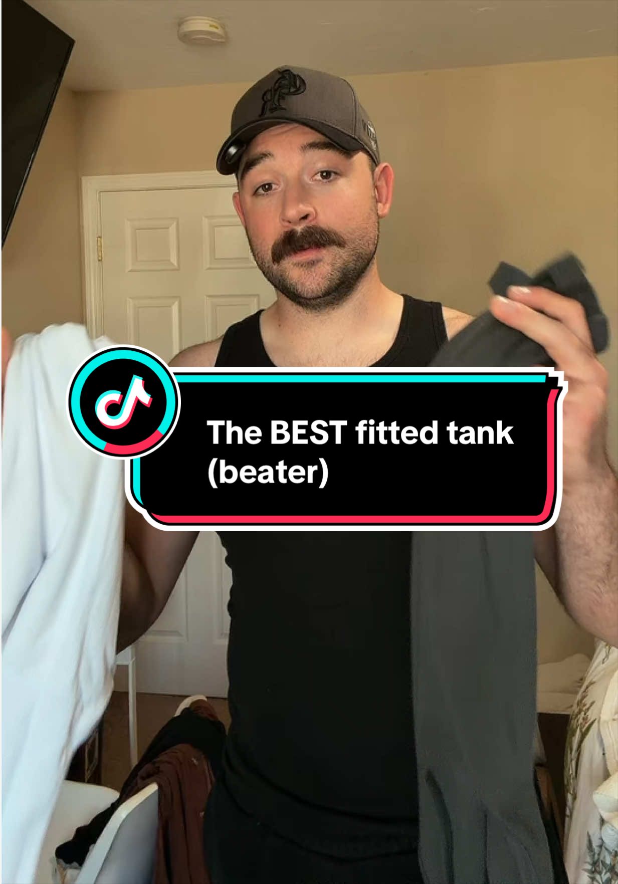 TikTok post by @gargoylegains for Squidhaus. Caption reads: I’ve tried so many different tank tops and beaters....
