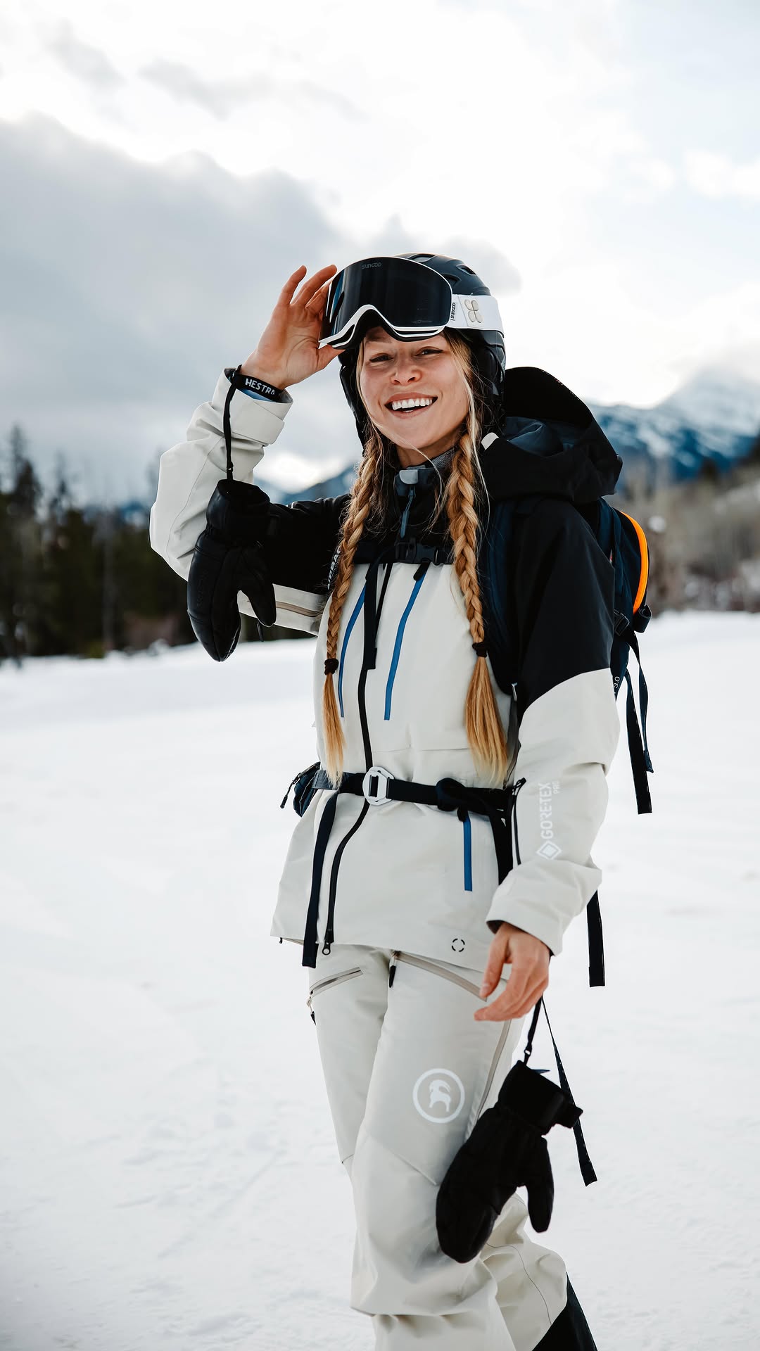 Instagram post by @roundtheworldgirl for Backcountry. Caption reads: Let’s go ski touring! So stoked on the new....