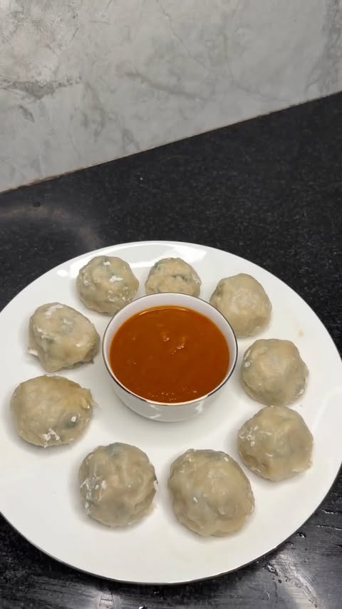 Instagram post by @faiza_unique_kitchen for The Indus Valley. Caption reads: [...] Rolling. Just Momos. Steamed with....