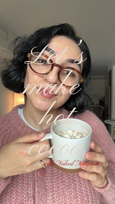 Instagram post by @emmawashere for NAKED nutrition. Caption reads: [...] creamy, and perfectly cozy 🍫⭐....