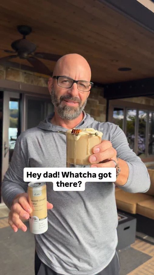 Instagram post by @johnnydrinks_ for Slate Milk. Caption reads: Halloween Candy White Russian 🍫 🥛 @slatemilk.