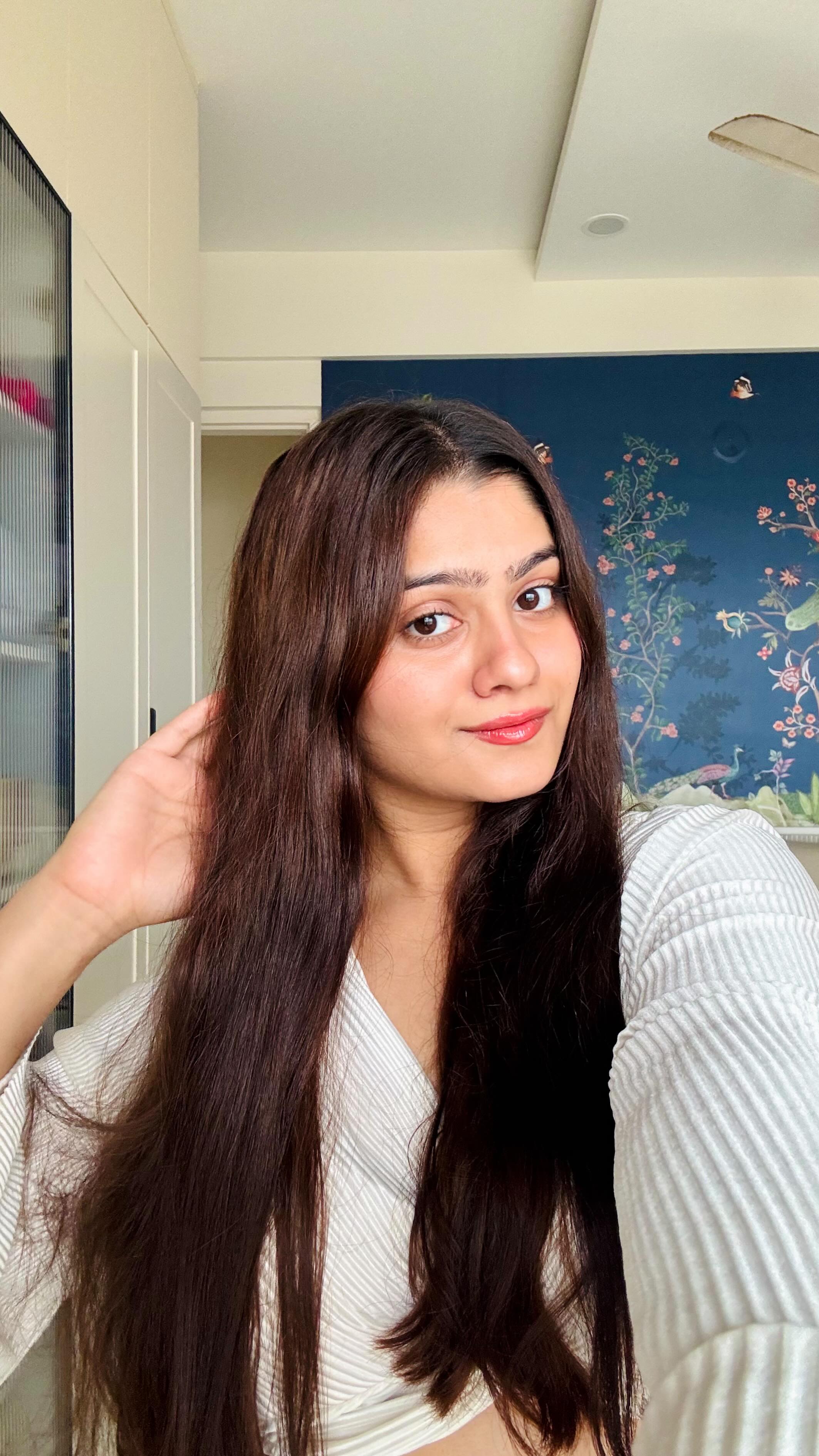 Instagram post by @thatdelhiigirl for Garnier India. Caption reads: #Ad Going brown and loving it! 💇‍♀️🌟 Change your....