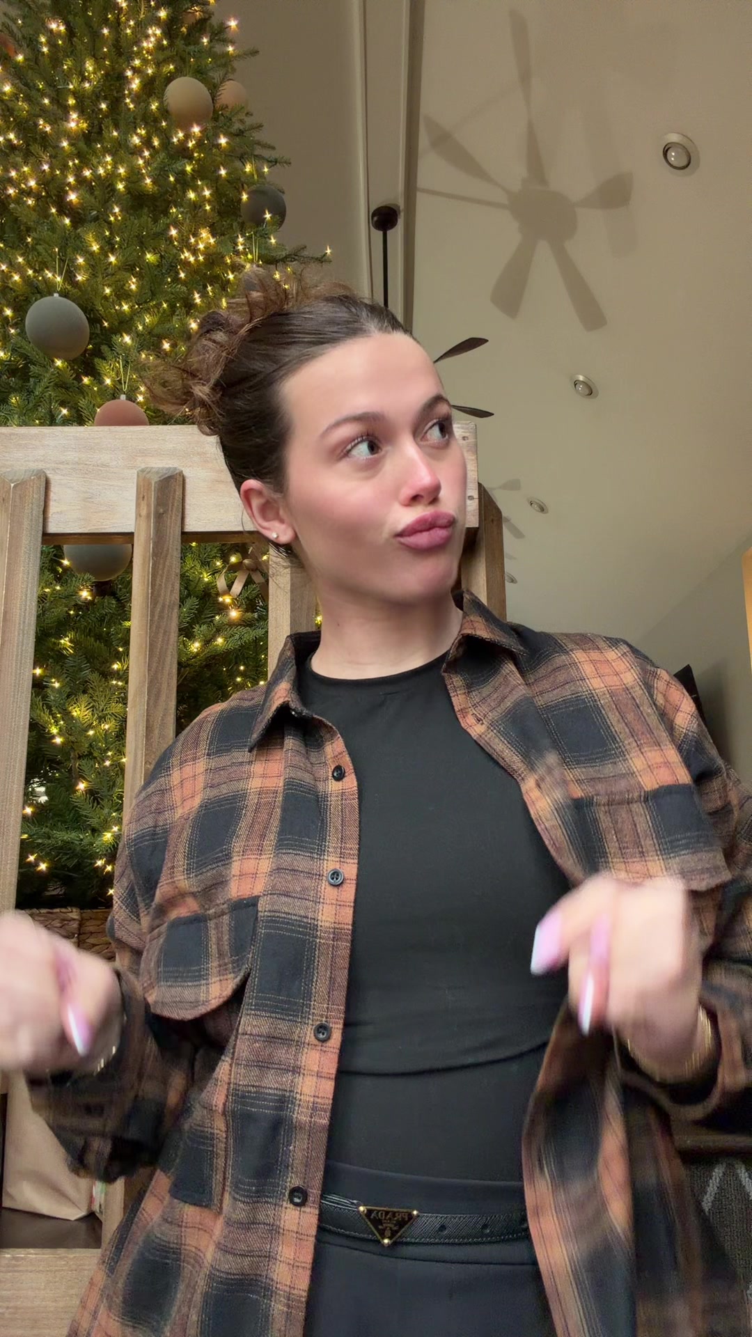 TikTok post by @fallanlanham for 12th Tribe. Caption reads: [...] morrible in a cutie flannel from @12TH TRIBE....