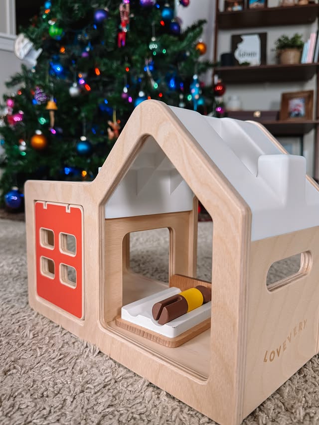 Instagram post by @ashleyburkblog for Lovevery. Caption reads: only 24 more sleeps until christmas....