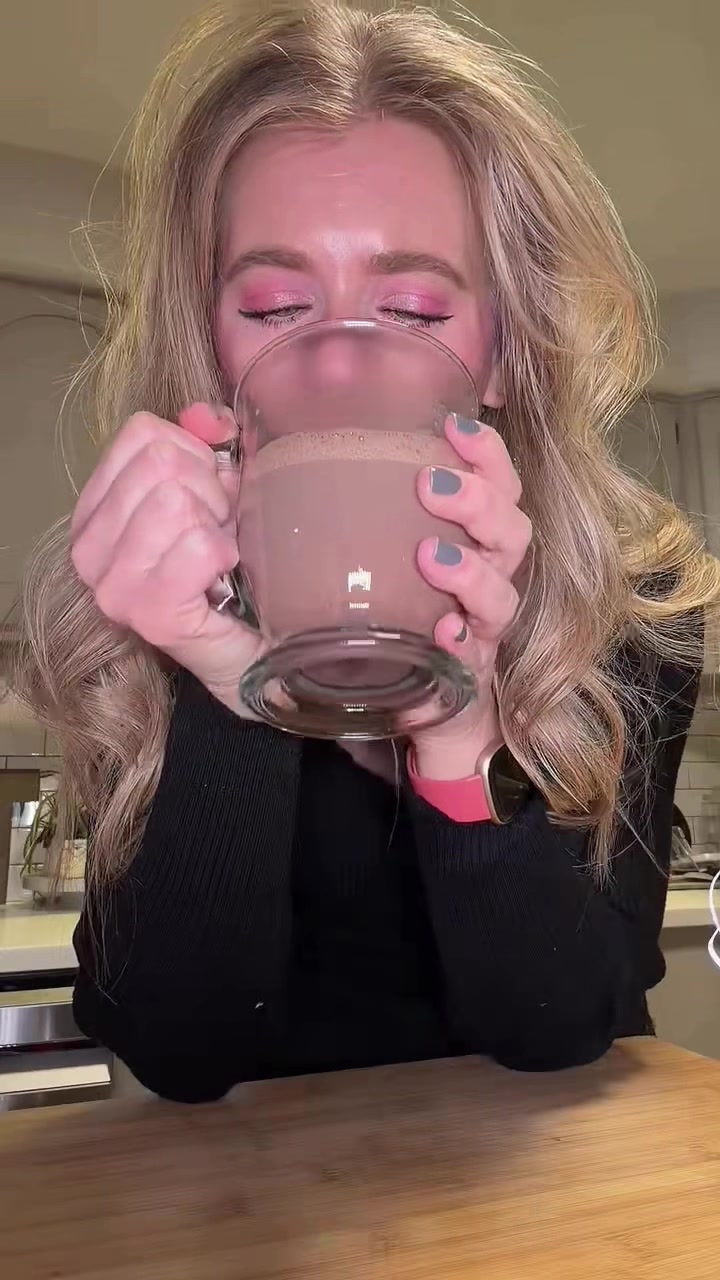 TikTok post by @iamsarahtonin for Bones Coffee Company. Caption reads: This hot chocolate is different! I add it to milk....