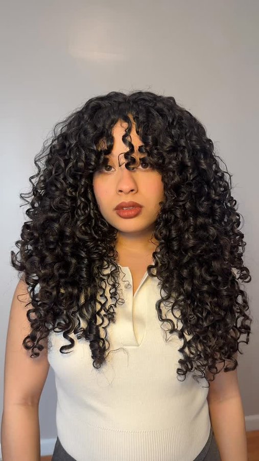 Instagram post by @curlswithalexa for Verb Products. Caption reads: If your curls are frizzy & you don’t include an....