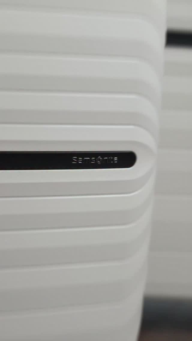 Instagram post by @laurahazzouri for David Jones. Caption reads: Shop these gorgeous Samsonite suitcases at....