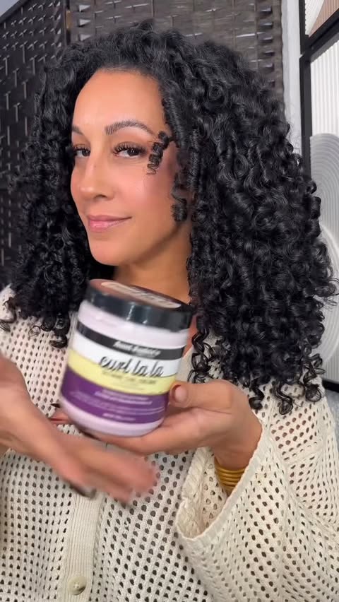 Instagram post by @curly_lala for Aunt Jackie's Curls & Coils. Caption reads: Tell me why my curls are literally singing 🎶La La....