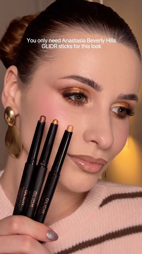 Instagram post by @annakozlovaugc for Anastasia Beverly Hills. Caption reads: Try the Anastasia Beverly Hills GLIDR eyeshadow....