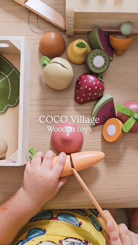 Instagram post by @raising.retas for Coco Village. Caption reads: Theee most beautiful wooden toys, my two year old....