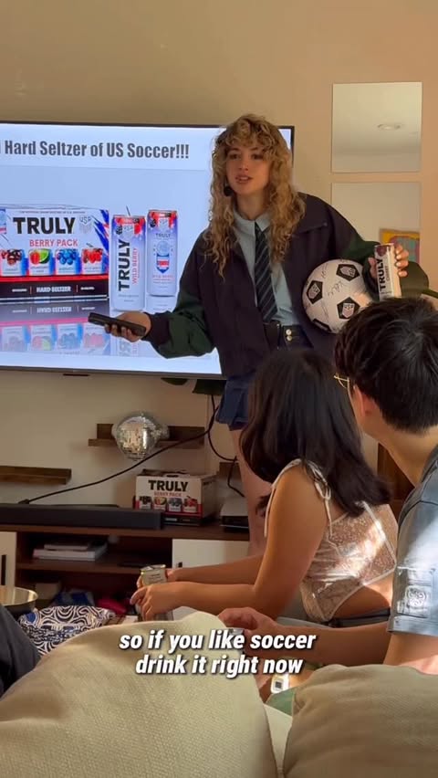 Instagram post by @brittneyraeallday for Truly Hard Seltzer. Caption reads: I love soccer. 🙏🏼 because Truly is the official....