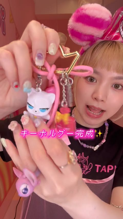 Instagram post by @shien_300 for Zuru Toys. Caption reads: ASMR開封??🎀💗✨💫 @zuru.toys さんのチャームを開封してみたよ🧚✨....
