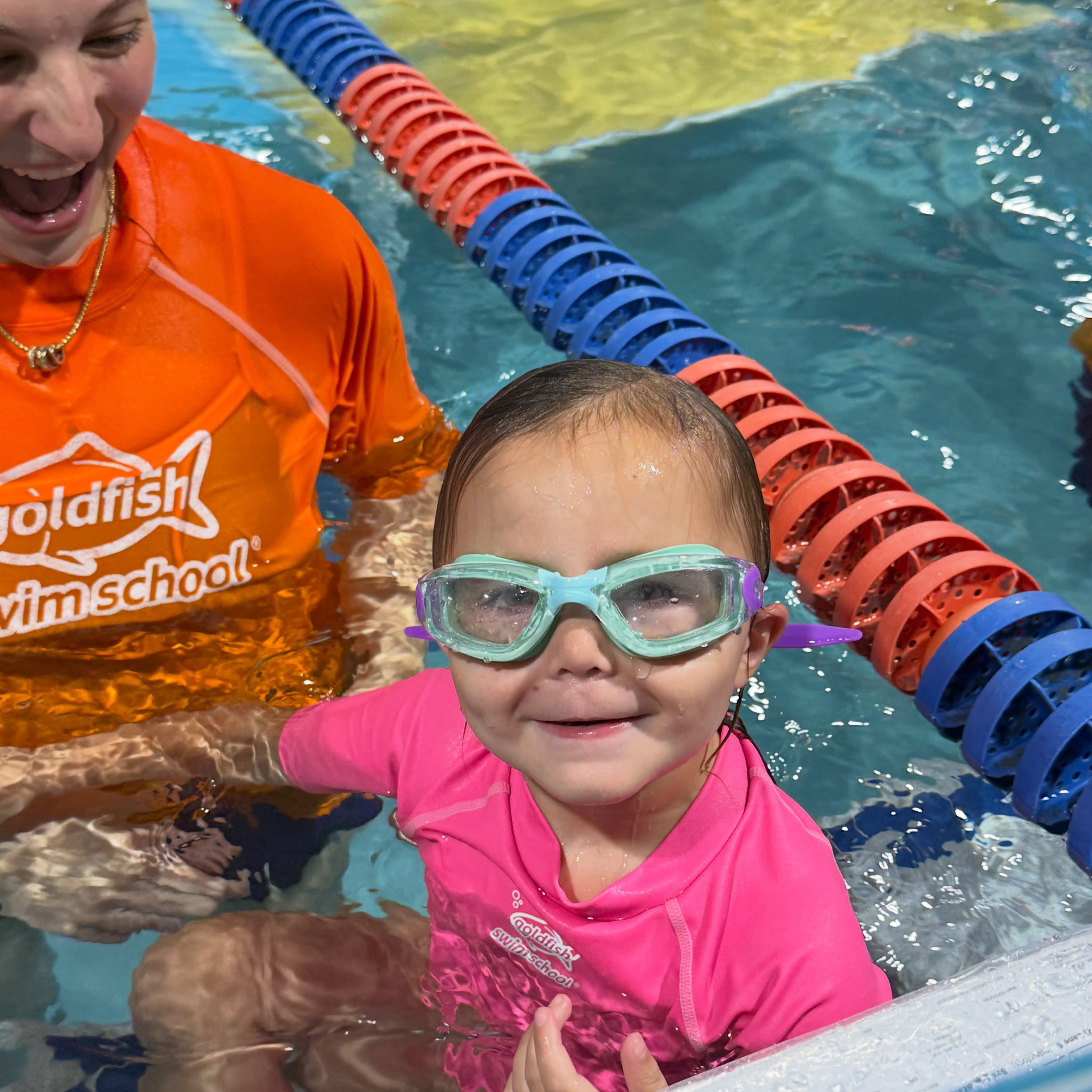 Instagram post by @memory.making.mama.nj for Goldfish Swim School. Caption reads: [...] doubt, our weekly swim lessons at....