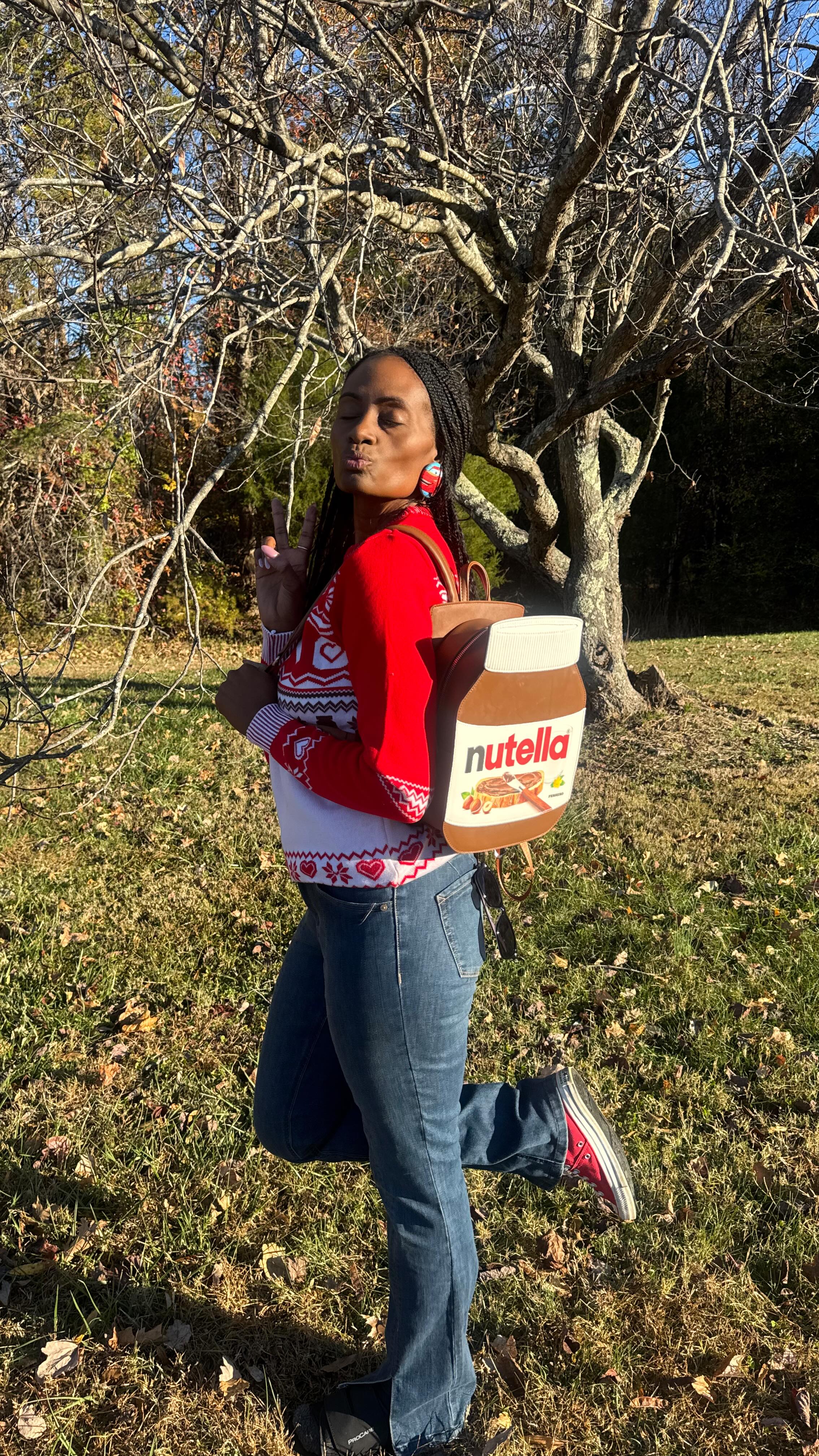 Instagram post by @raisingculturesfamily for Nutella. Caption reads: These kids be taking me thru dere, especially that....