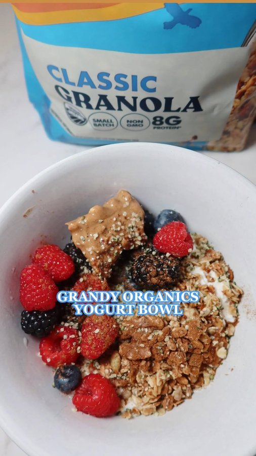 Instagram post by @dietitiancass for Grandy Organics. Caption reads: #ad My breakfast yogurt bowls just got 10000x....