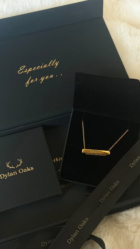 Instagram post by @sadiarashidmua for Dylan Oaks. Caption reads: [...] engraved necklace .Thanks you....