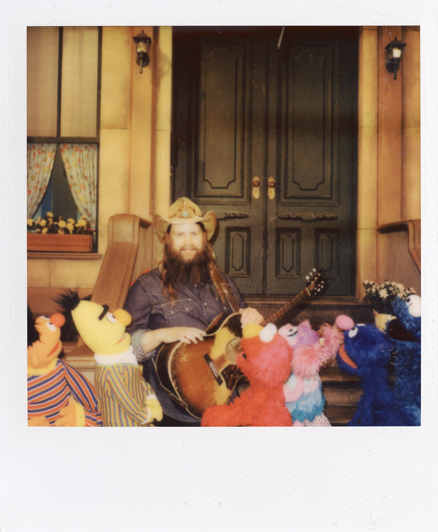 Instagram post by @chrisstapleton for Sesame Street. Caption reads: BTS @sesamestreet 

📸: @andybarron.