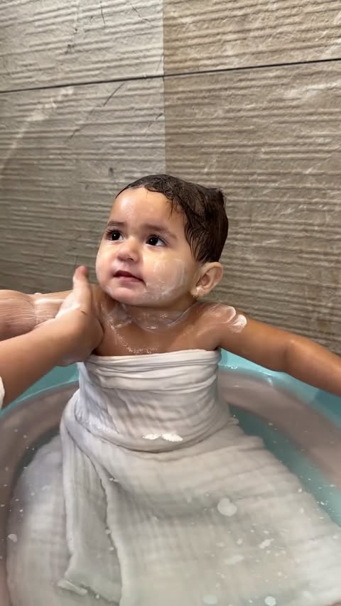 Instagram post by @teertha.tales for Johnson’s Baby. Caption reads: [...] and a little bit of patience 🛁✨....
