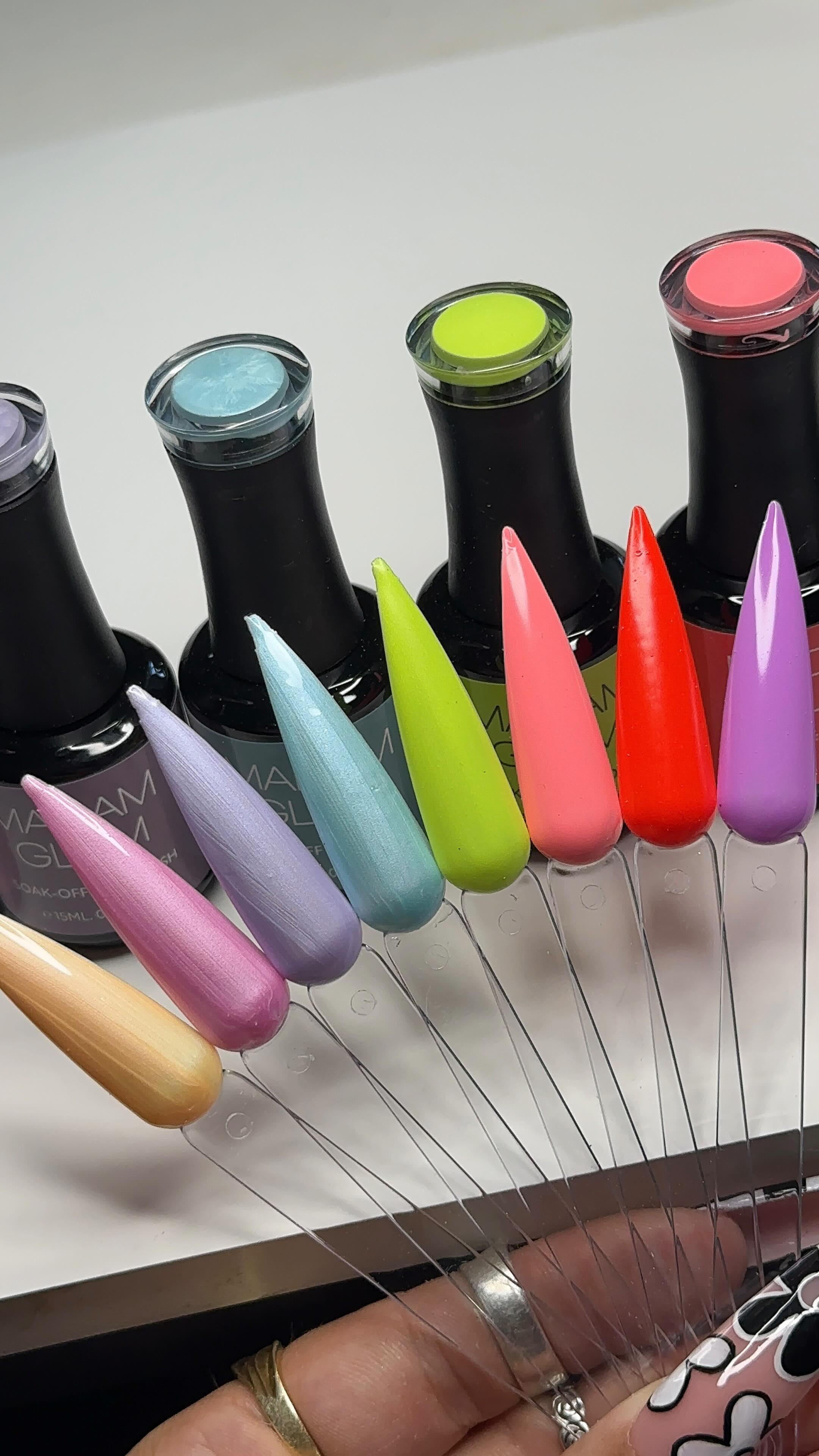 Instagram post by @nails_by_lindsay_ for Madam Glam. Caption reads: SO EXCITED FOR MORE SATIN GELS 🤩 @madam_glam....