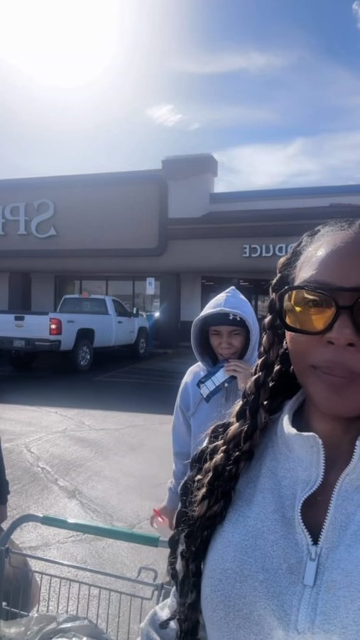 Instagram post by @iamakishajenee for Snuggie. Caption reads: [...] Embrace the fuzziness with @officialsnuggie....