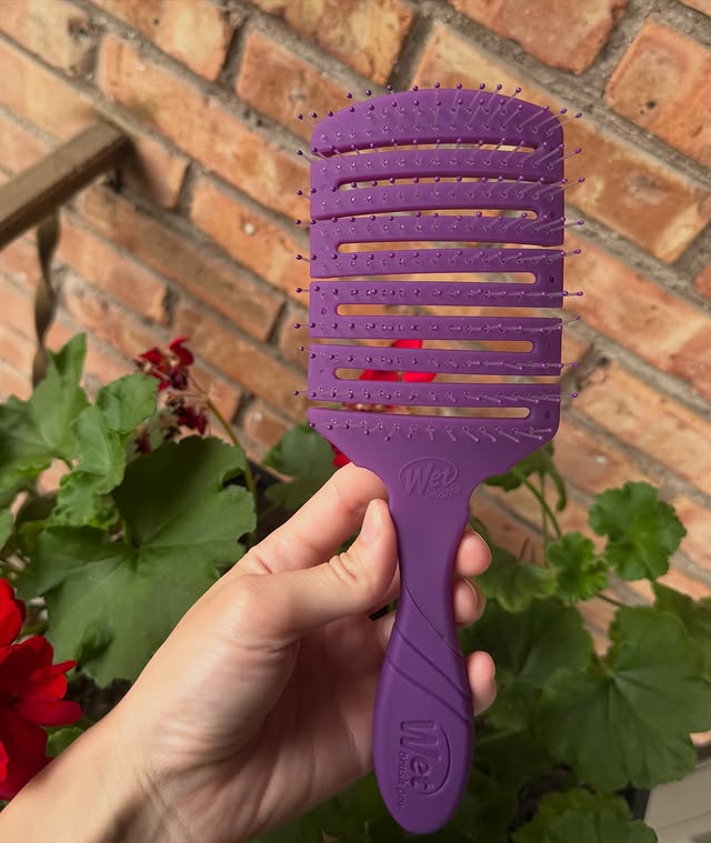 Instagram post by @bmcreativ for Wet Brush. Caption reads: [...] keep reaching for! @influenster @thewetbrush....