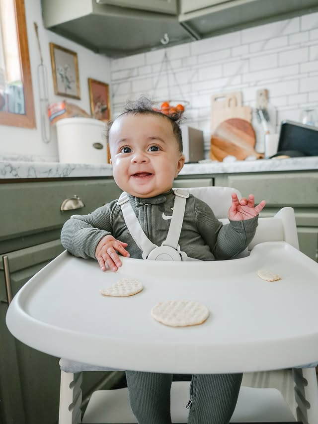 Instagram post by @mrscarr_ for Stokke. Caption reads: #StokkePartner Russell is 6 months old now and....