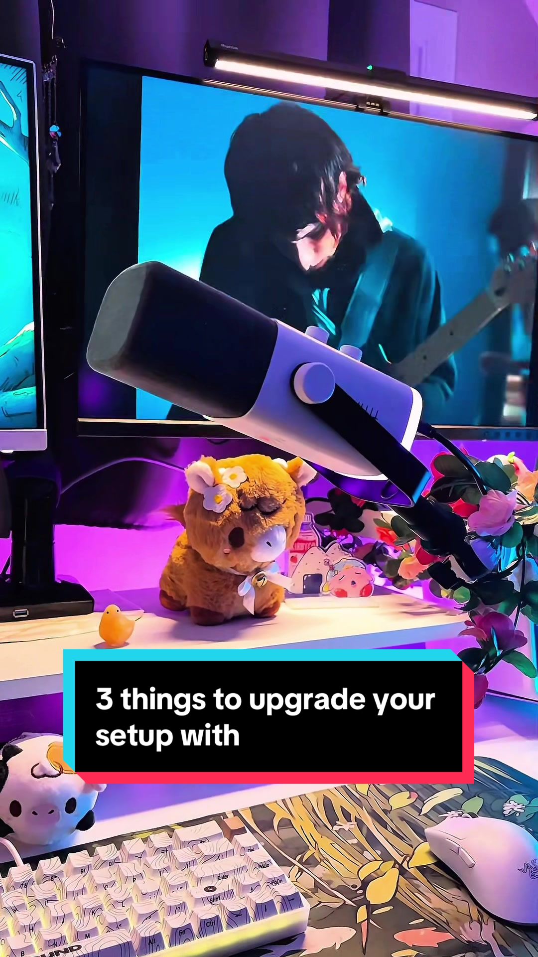 TikTok post by @velaslive for HUANUO. Caption reads: 3 ways I upgraded my setup to save desk space and....