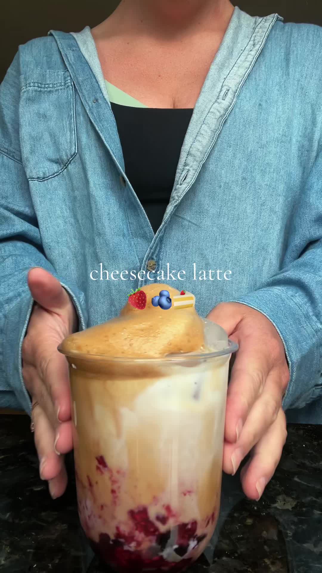 TikTok post by @oliviaaa.choi for Syruvia. Caption reads: [...] at home, cheesecake latte @NESCAFÉ USA....