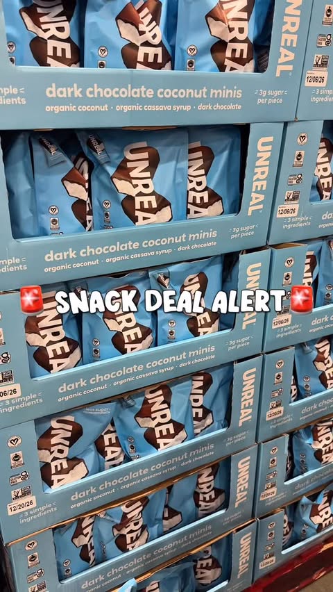 Instagram post by @costcodeals for UNREAL Snacks. Caption reads: #unrealpartner 🚨 SNACK DEAL ALERT🚨....